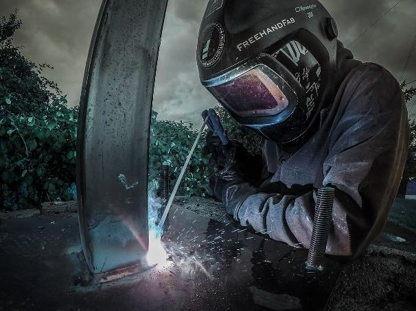 professional welder doing arc welding